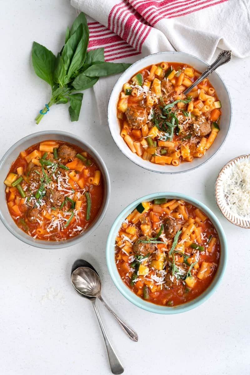 Three bowls of minestrone soup