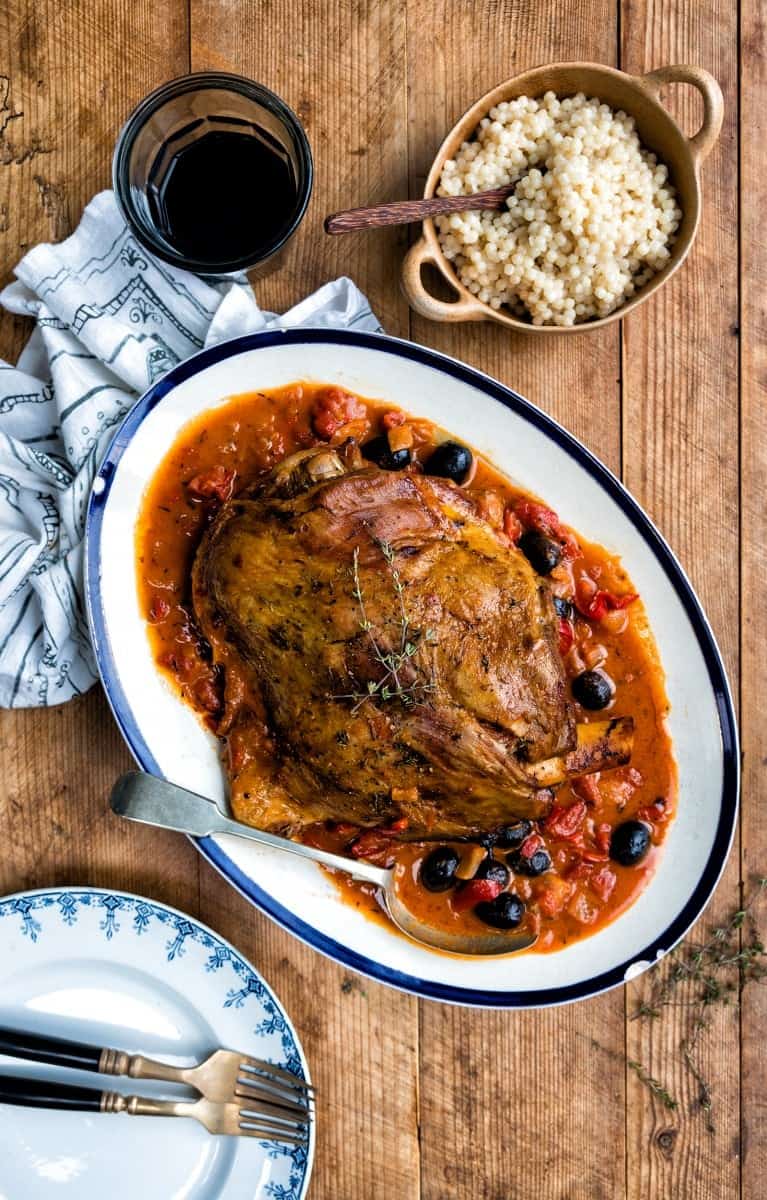 One-pot slow cooked lamb shoulder with tomatoes, olives and anchovies