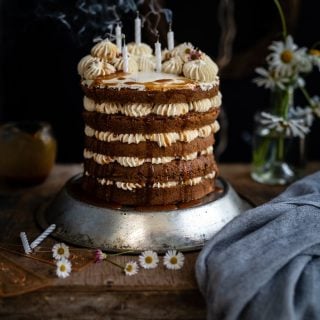 Earl Grey layer cake with candles blown out