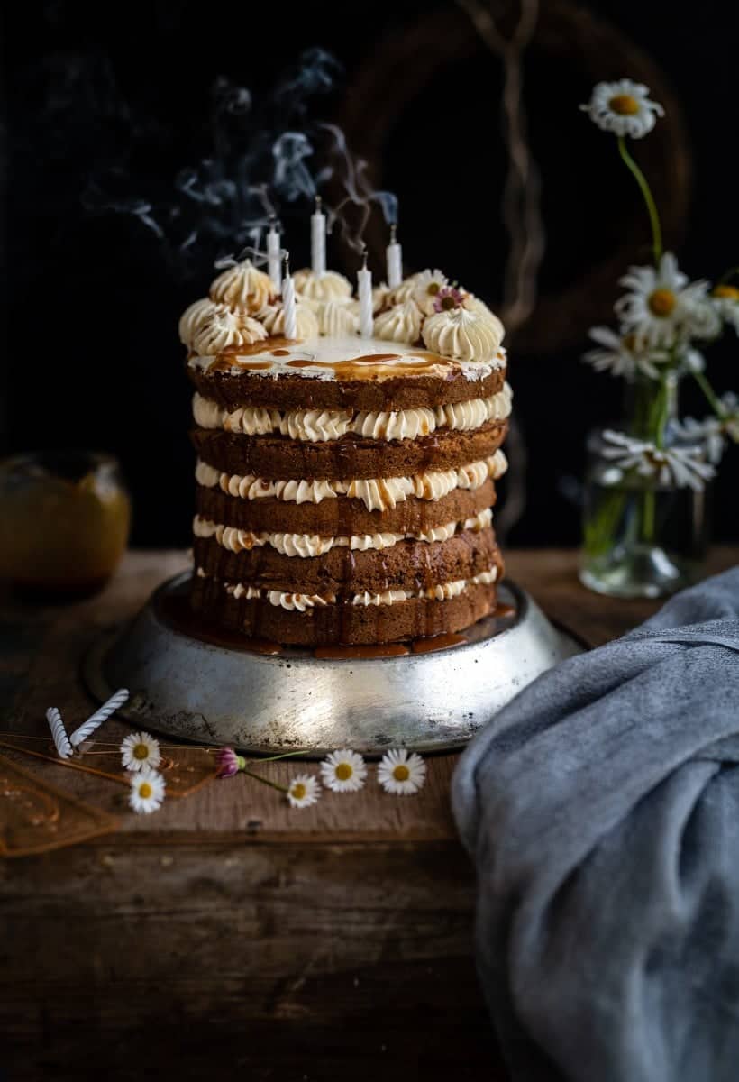 Earl Grey layer cake with candles blown out