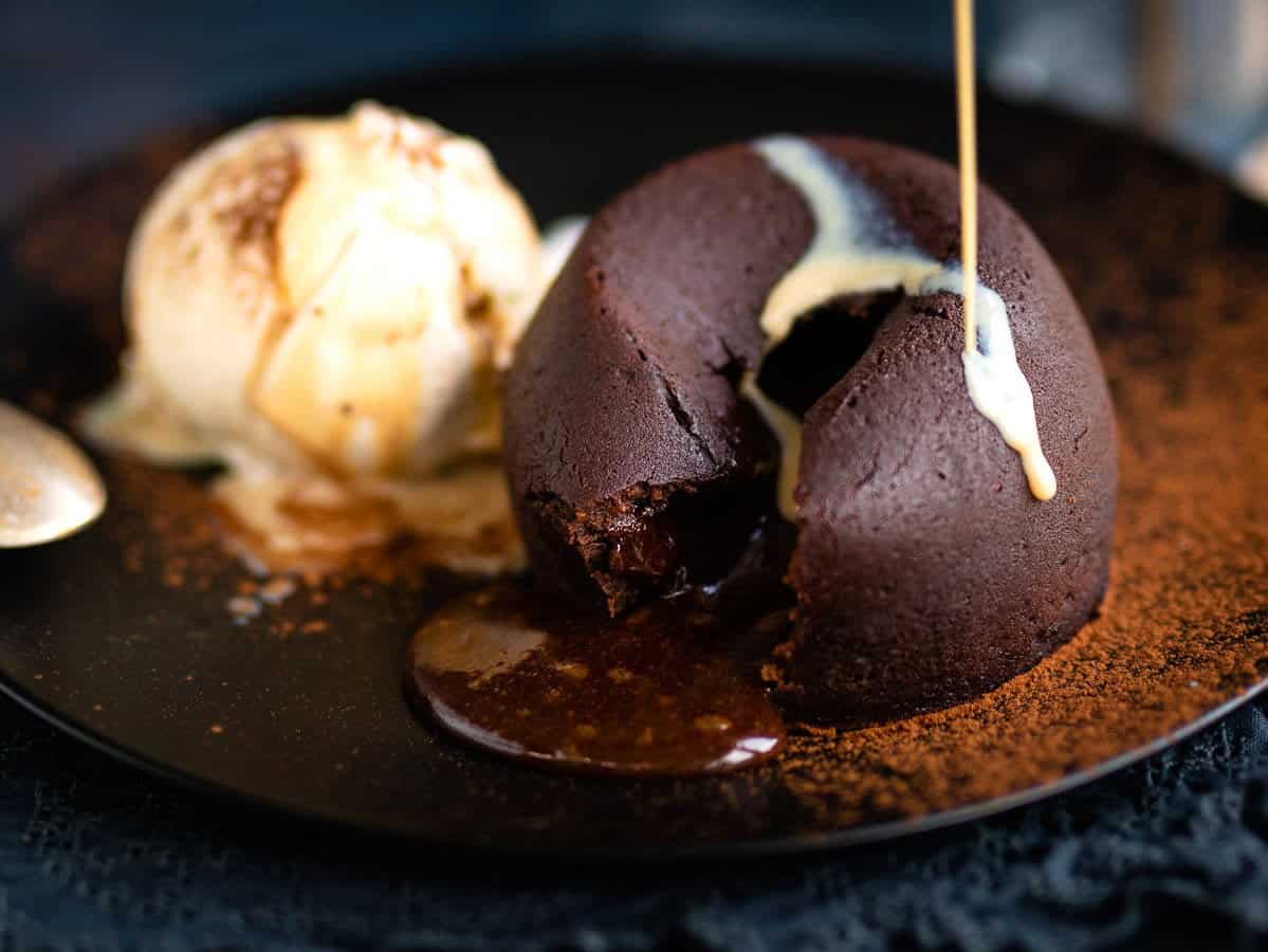 Chocolate lava cakes served with vanilla ice cream
