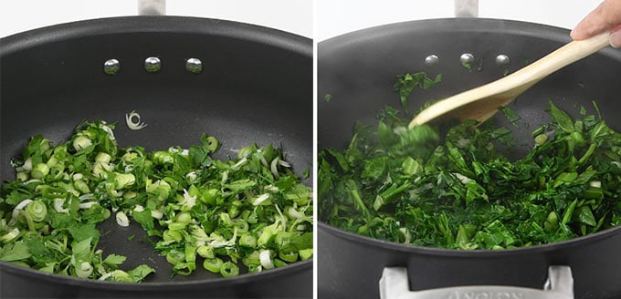 pan frying spring onions, herbs and spinach in a pan