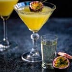 Adding a slice of passion fruit to a Porn Star Martini