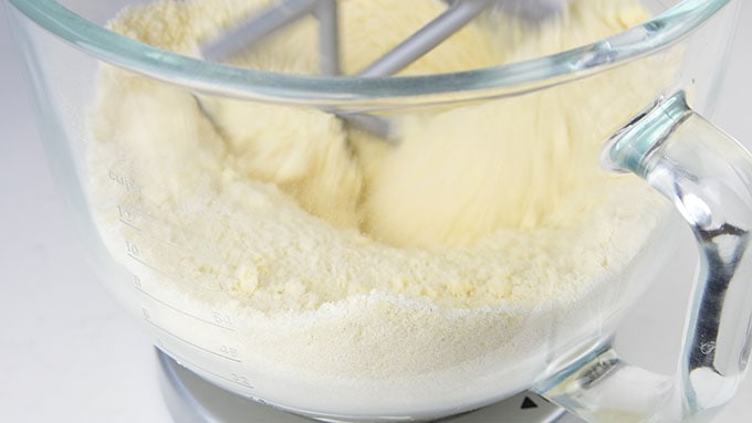 Mixing the dry ingredients for white cake in a stand mixer
