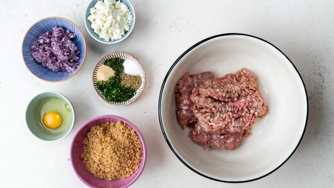 Greek Meatballs ingredients: ground turkey, breadcrumbs, feta cheese, onion, herbs