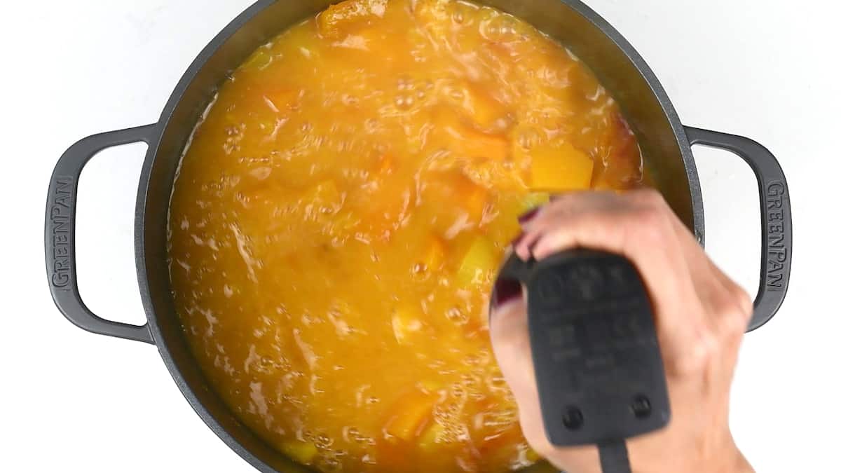 Blending squash soup with an immersion blender