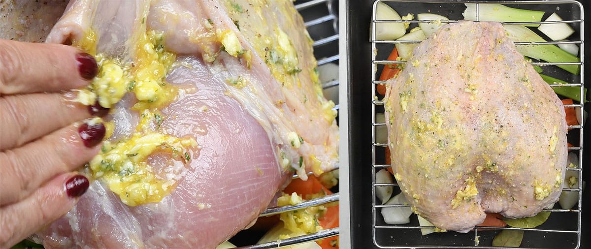 Rubbing turkey crown with herb butter prior to roasting