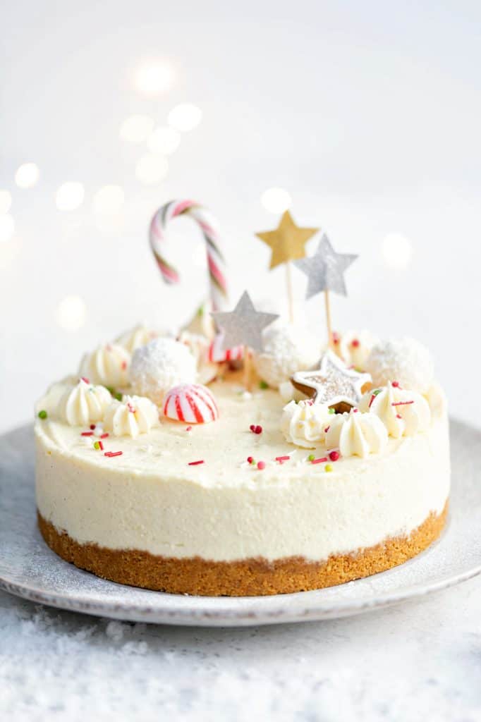 Christmas Cheesecake decorated with festive sprinkles and stars