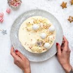 Christmas cheesecake on a plate with festive decorations