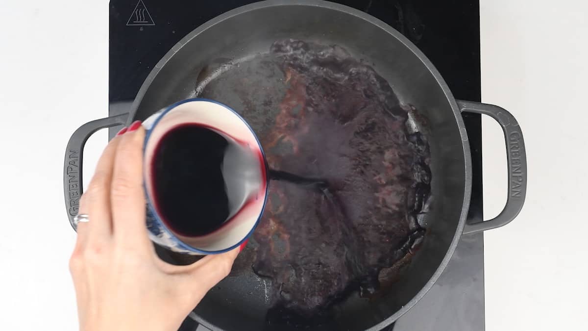 Deglazing pot with red wine