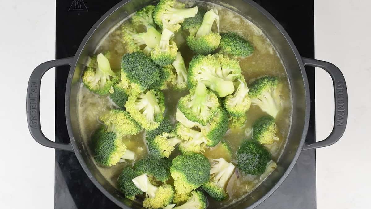 broccoli soup cooking in large pot