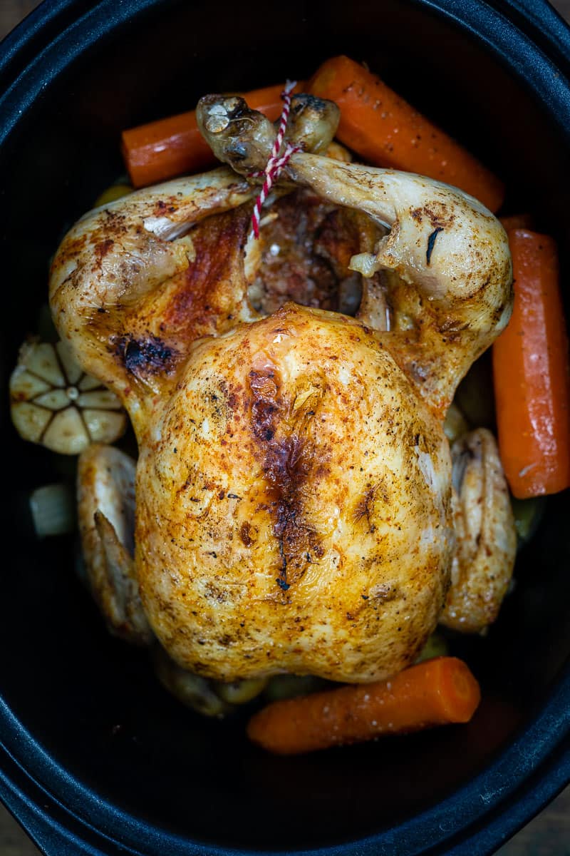 Whole Chicken cooked in the slow cooker with carrots 
