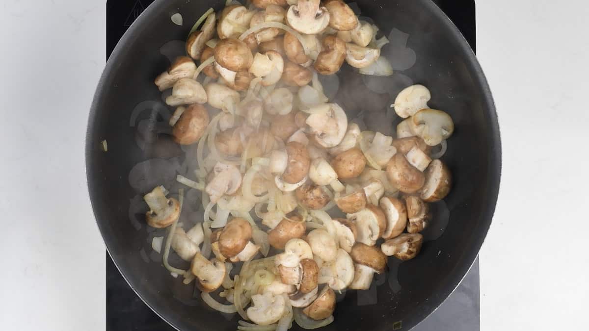 Pan frying onions and mushrooms