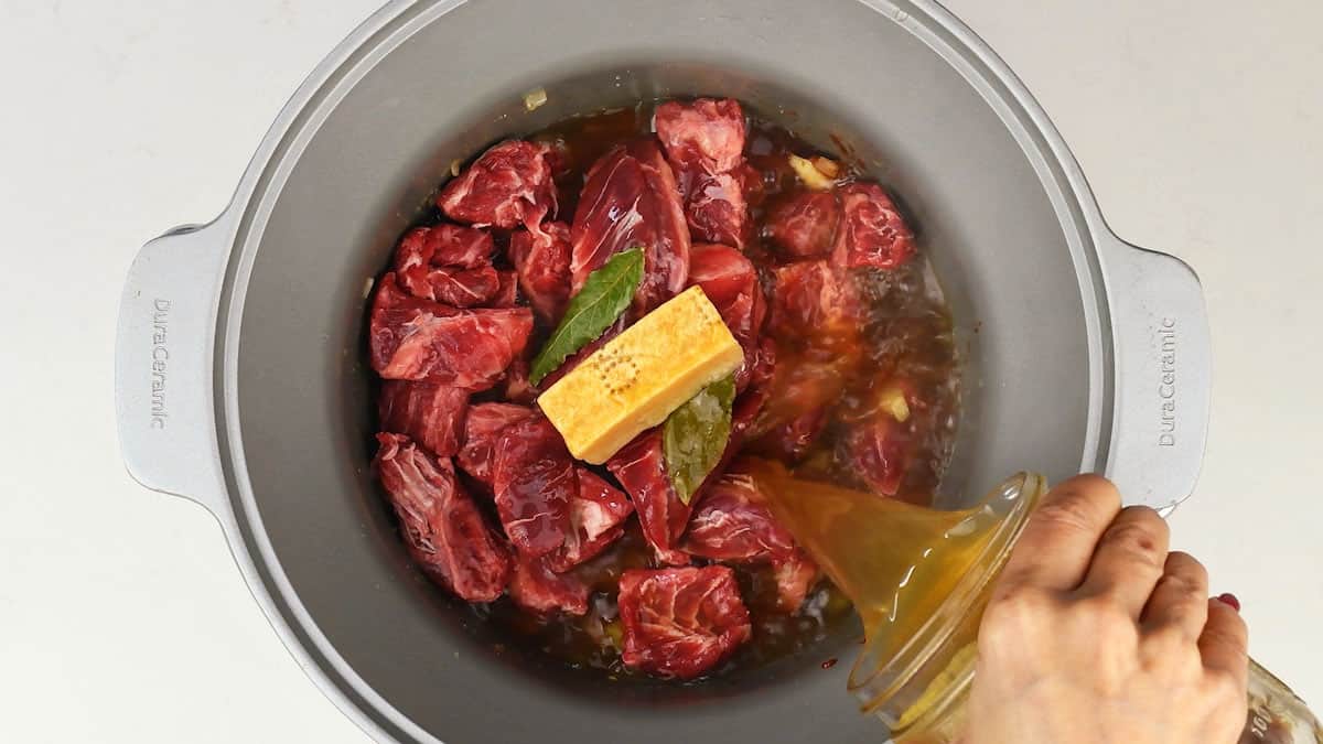 Adding stock to slow cooker beef ragu