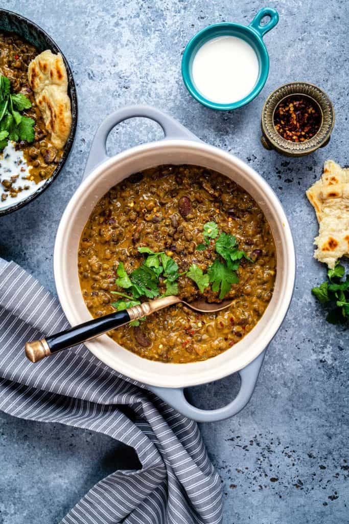 Pot of Dal Makhani with coriander leaves