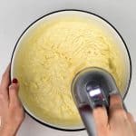 Beating cake batter with an electric hand mixer