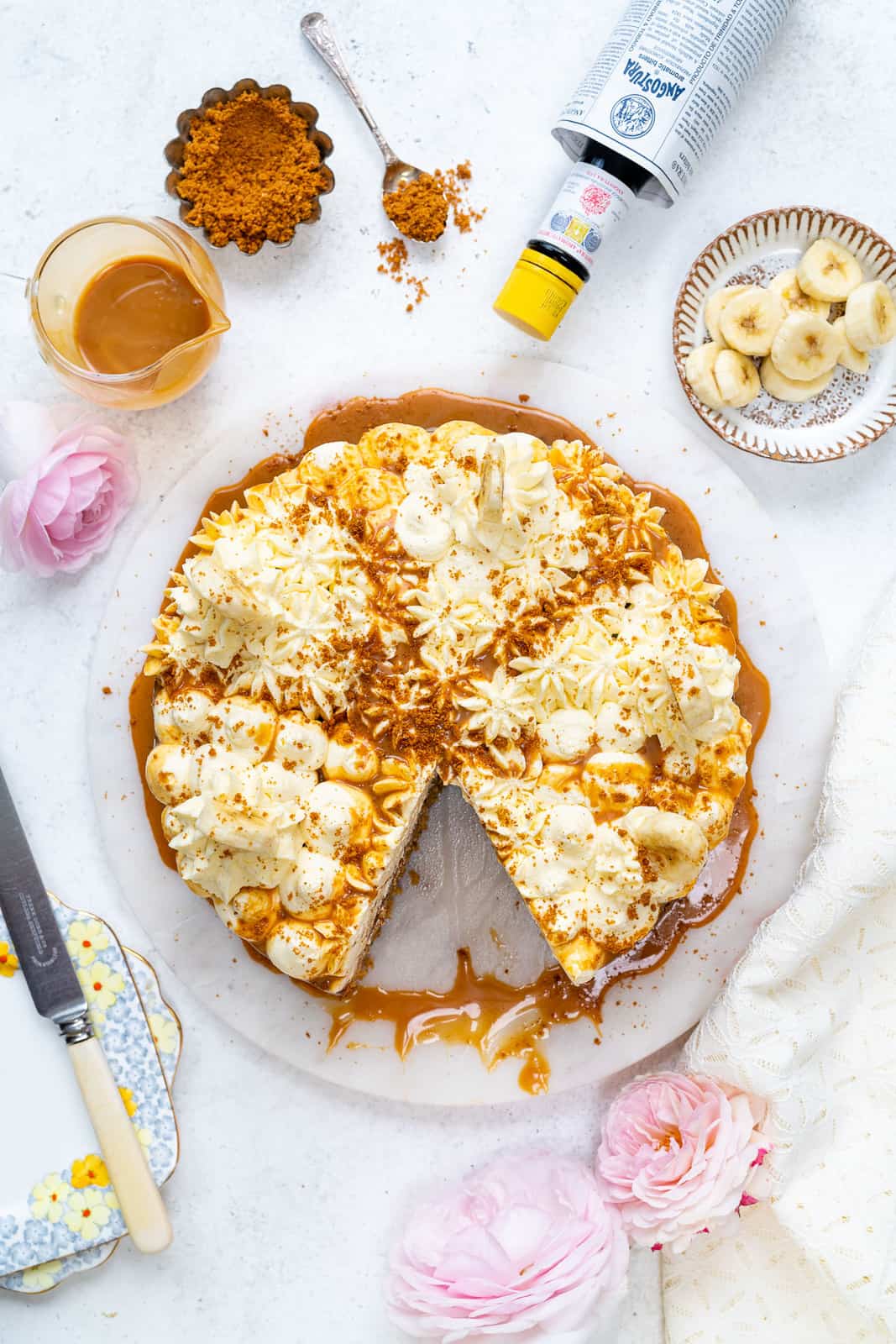 Banana Cake topped with whipped cream and caramel