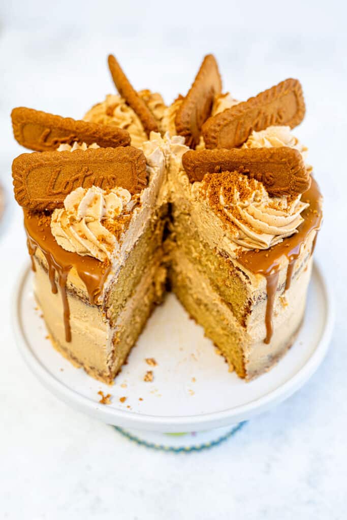 Cookie butter layer cake with slice taken out