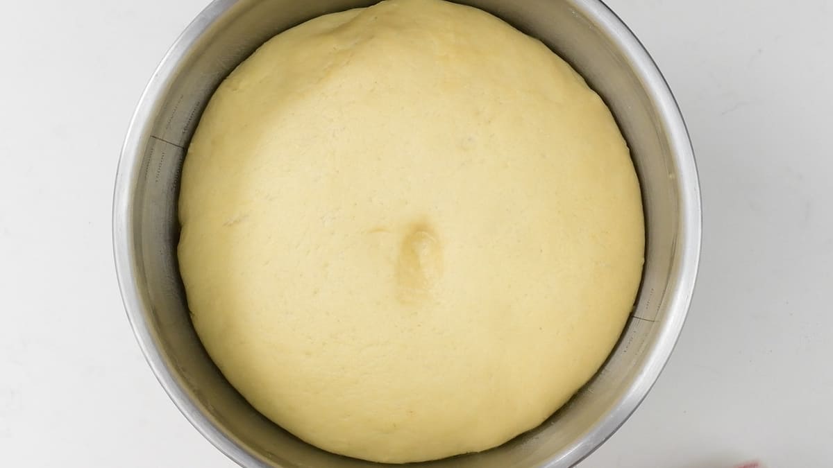 Risen brioche dough after first proving