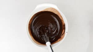 Chocolate ganache in a mixing bowl