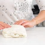 doing a letter fold on bread dough