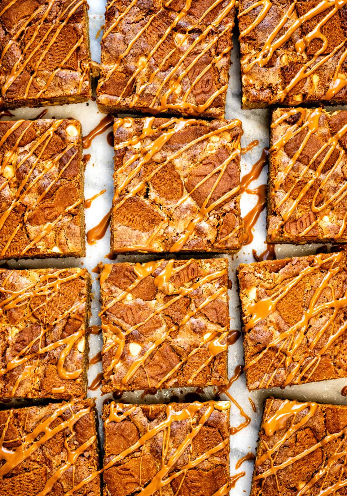 close up on sliced Biscoff Blondies drizzled with Lotus Biscoff spread