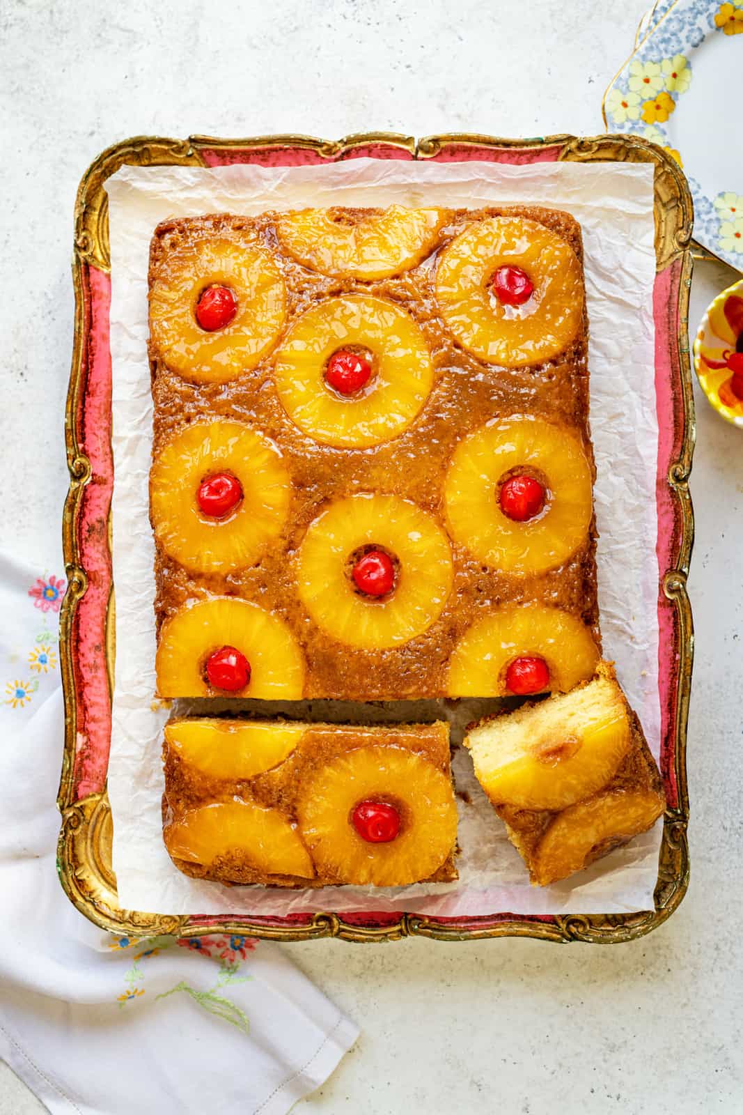 Pineapple Upside Down Cake shown on a decorative tray