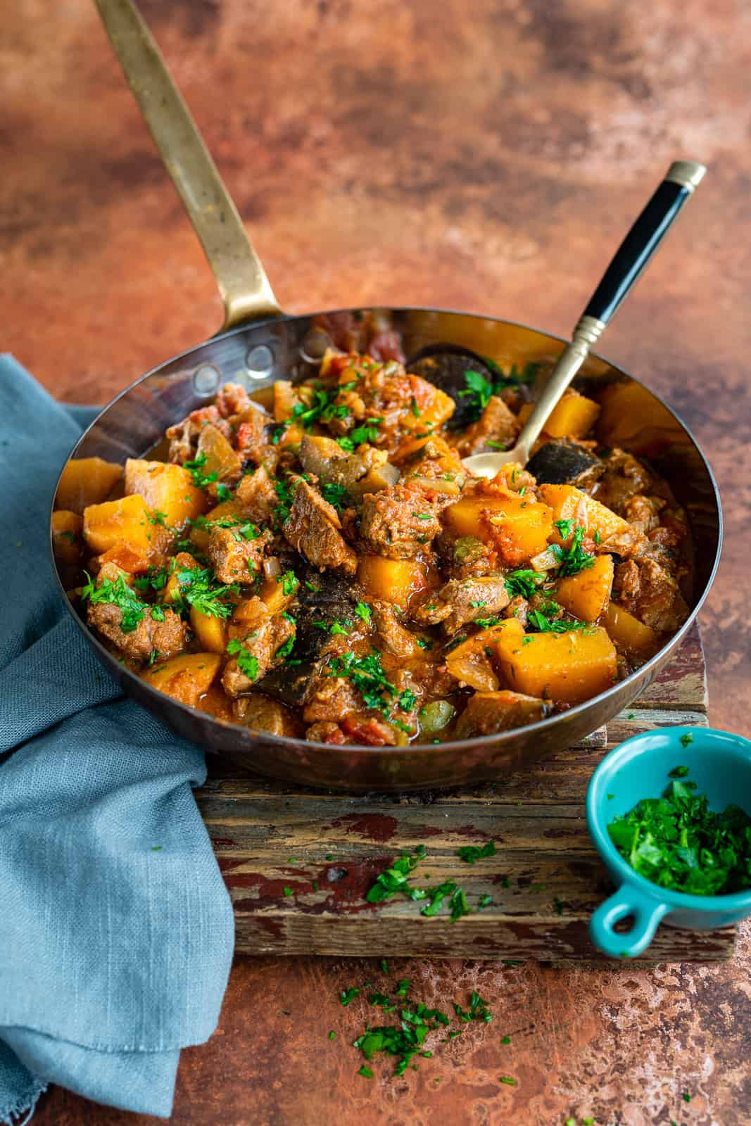 Slow cooker lamb stew with aubergines, swede and olives