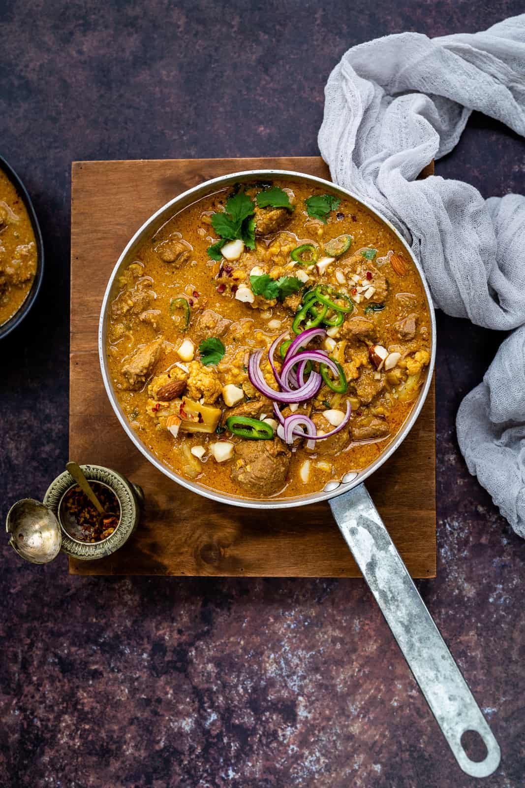 Lamb curry with cauliflower and coconut milk in a pan