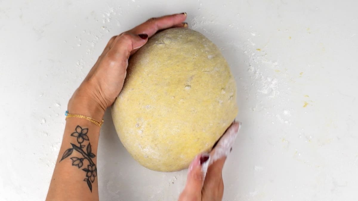 shaping dough into a boule