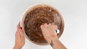 stirring flour, cocoa powder and sugar together in a bowl