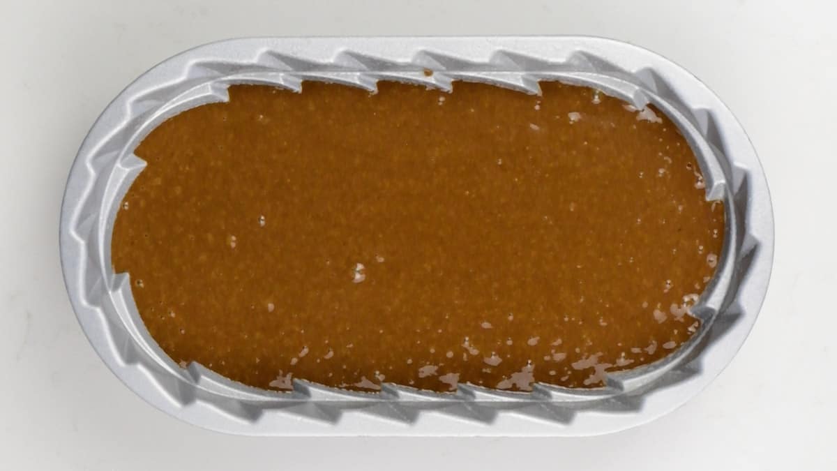 gingerbread loaf batter in a loaf tin