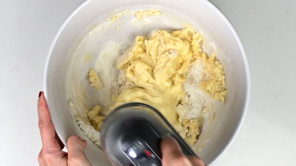 Beating cake batter with an electric mixer