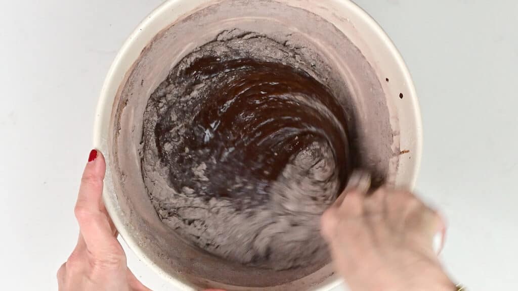 Making brownie batter in a mixing bowl