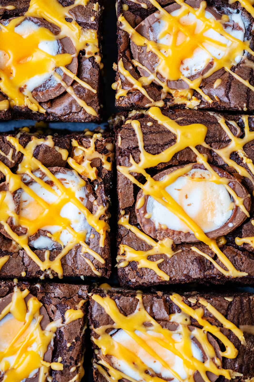 Close up on Creme Egg Brownies topped with Cadbury's Creme Eggs