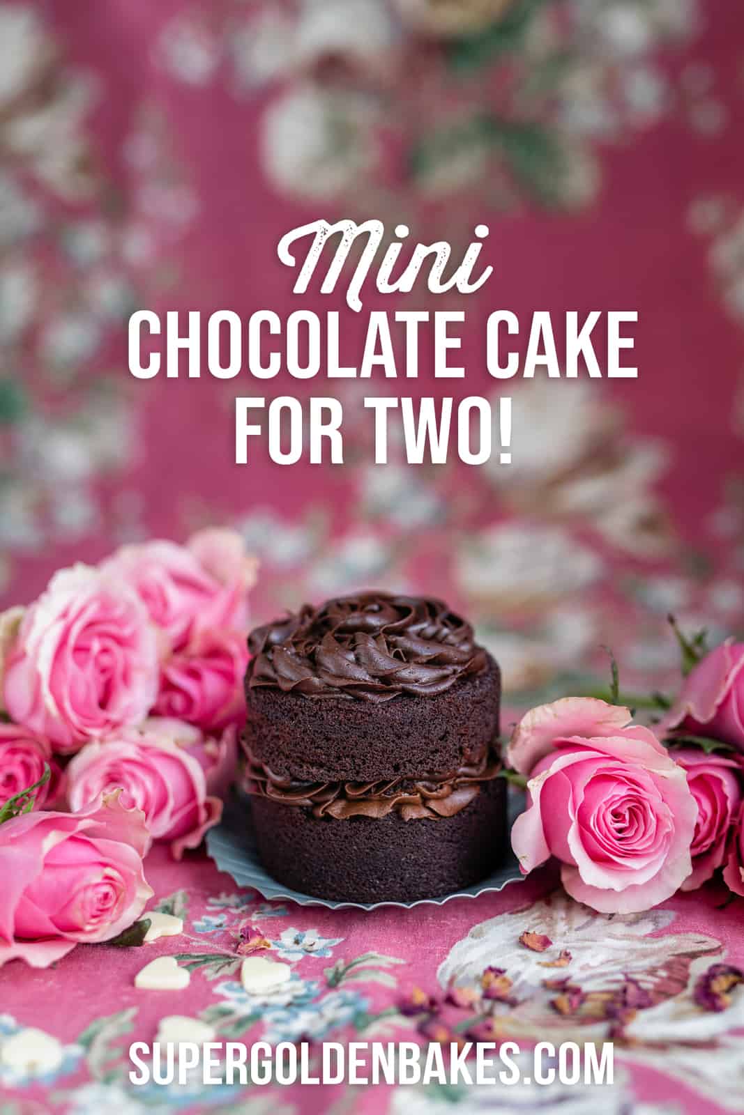 Mini chocolate layer cake on a floral background with pink roses