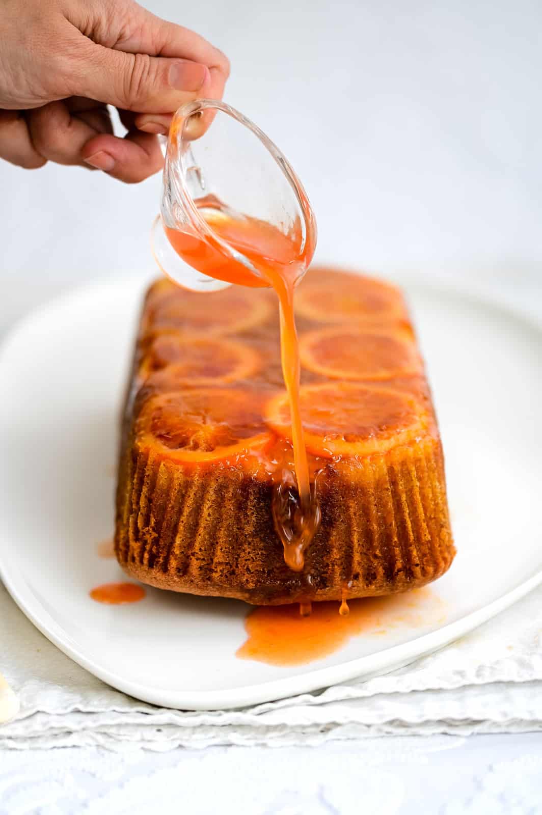 Orange Upside Down Cake drizzled with orange syrup