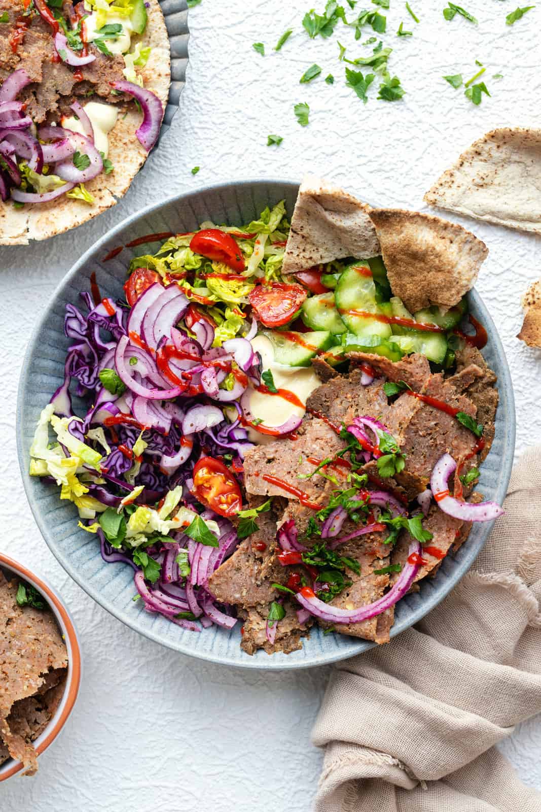 Slow Cooker Doner Salad Bowl with Cucumber, Tomato, Sliced Onions and Pita Bread