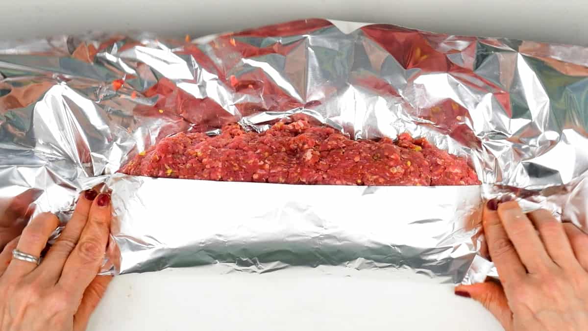 Wrap beef in aluminum foil