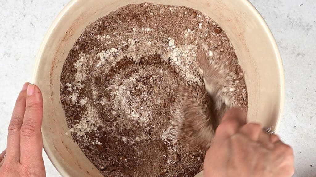 stirring flour, sugar and cocoa in a bowl