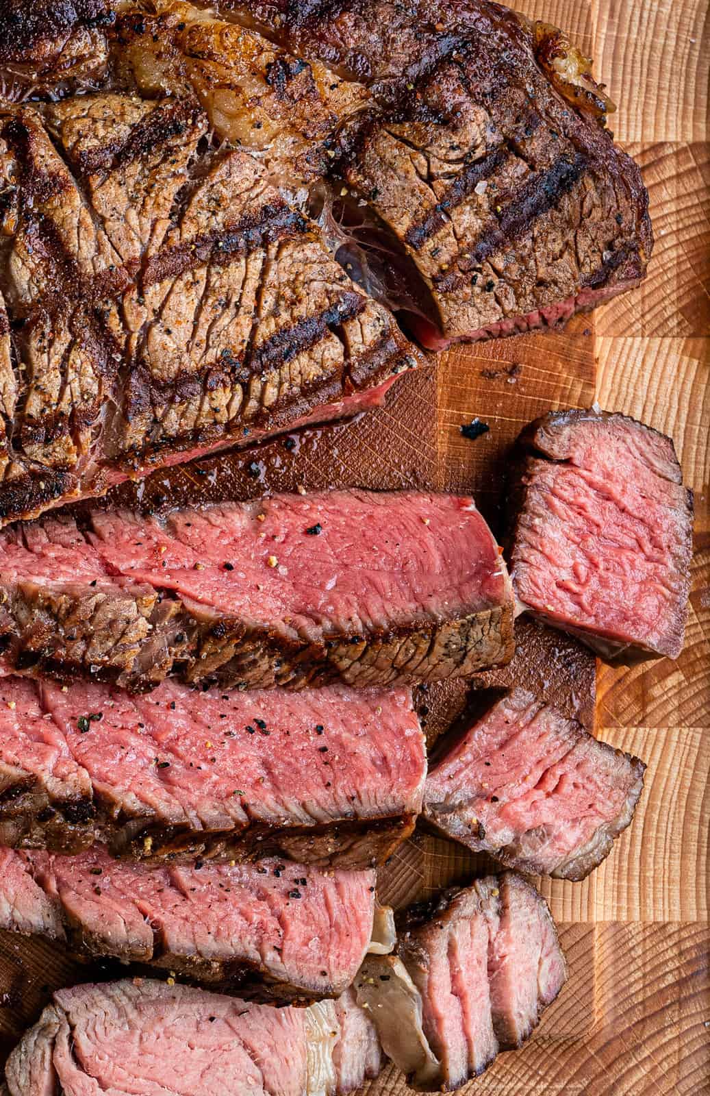 extreme close up on sliced steak cooked medium rare