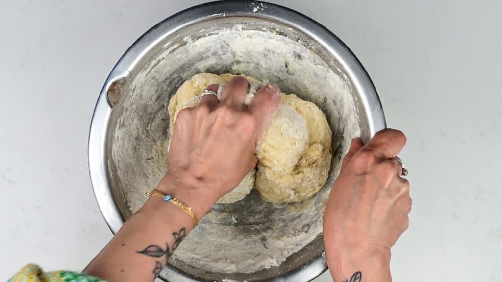 Mixing sourdough cinnamon roll dough 