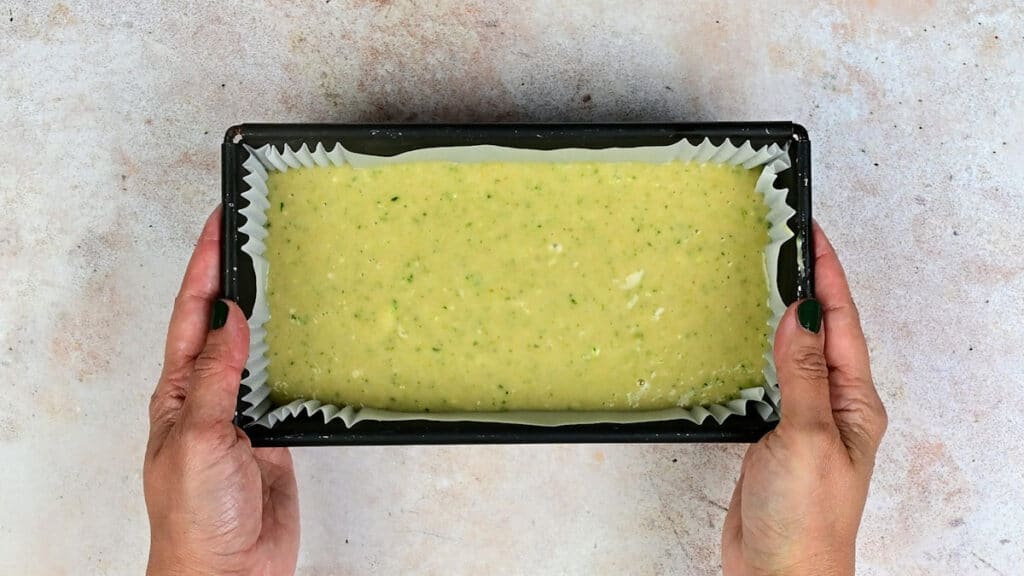 courgette cake batter in a small loaf tin