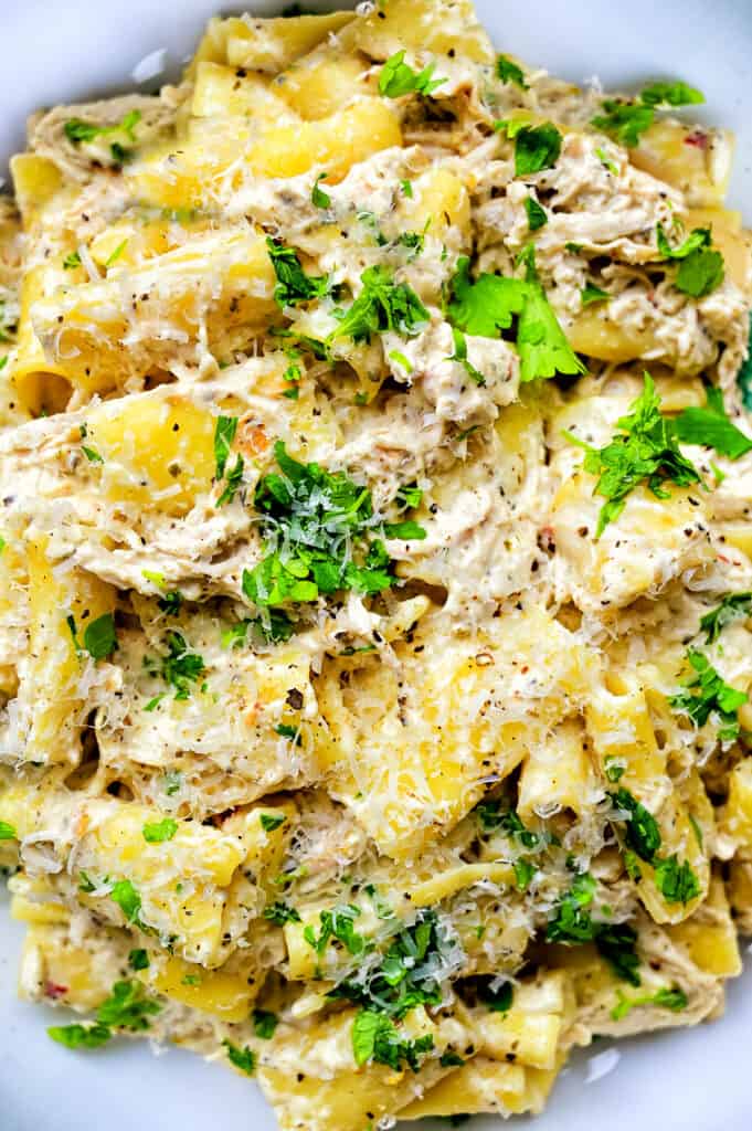 Creamy Olive Garden Chicken garnished with Parmesan and parsley