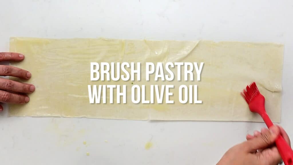 brushing phyllo with olive oil