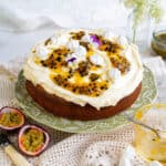yogurt cake topped with whipped cream and passion fruit jam