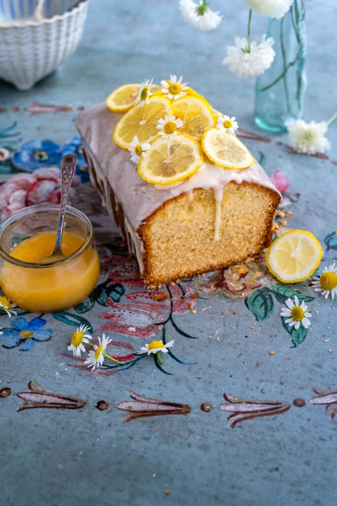 Lemon Curd loaf cake with slice cut to show interior texture