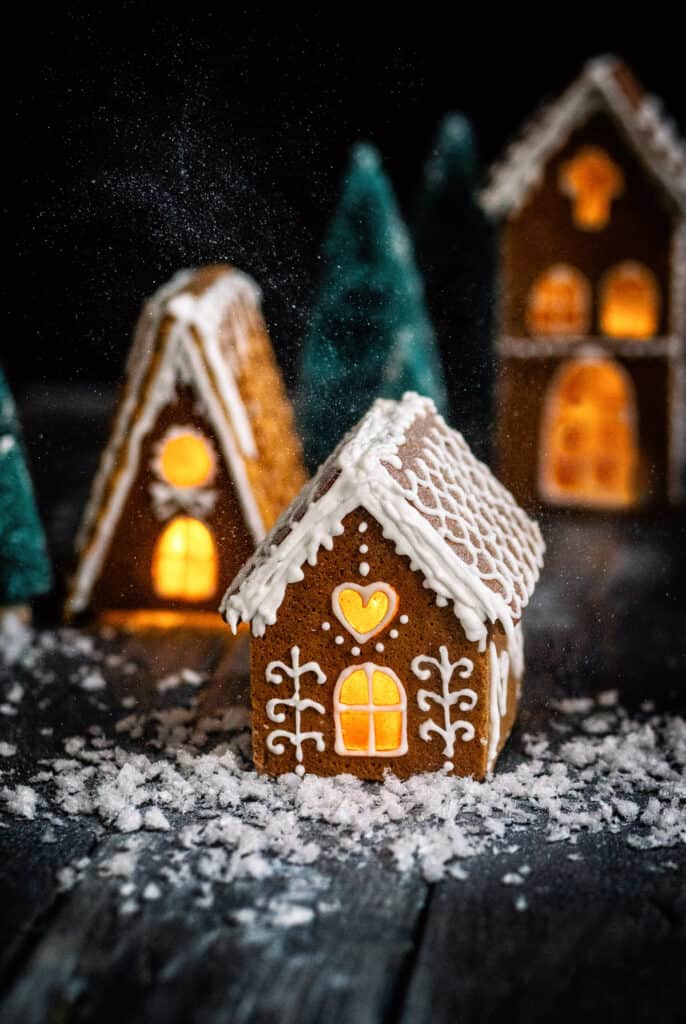 Gingerbread houses with bottle brush trees and festive lights