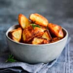 Bowl of crispy golden roast potatoes