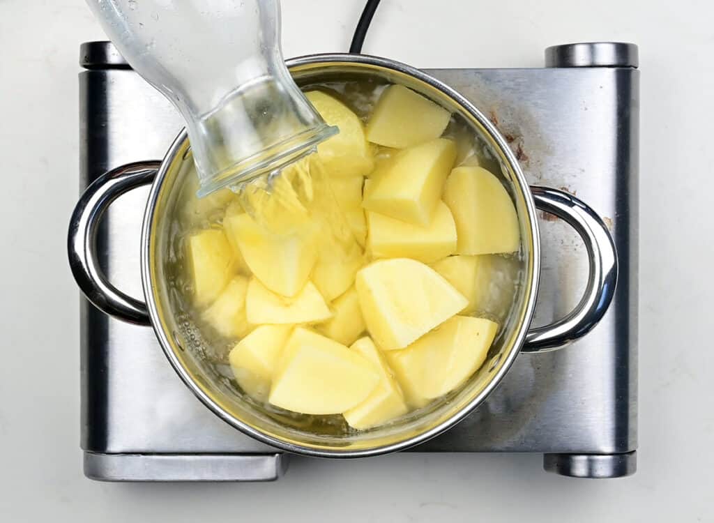 Cubed potatoes in a saucepan